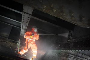 Its-a-tight-squeeze-in-the-bridge-deck-void-where-operatives-are-undertaking-a-full-clean-up-operation-before-bridge-hanger-repairs-can-begin-tyne-bridge-300x200.jpg