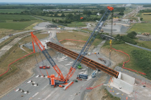 Lifting-the-main-steel-sections-that-form-the-beams-for-HS2s-Edgcott-Road-overbridge-June-2024-300x200.png